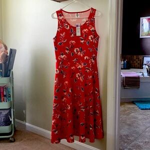 New with tags never worn floral dress in size medium.